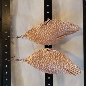 Earrings shimmering rose gold faux leather. Feather shape